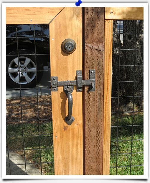 bronze hardware on wood door